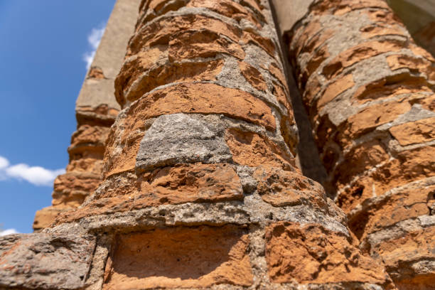 red brick ruins , damaged red bricks from the wall of an ancient building