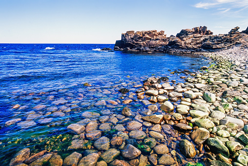 Stony beach by a sea bay