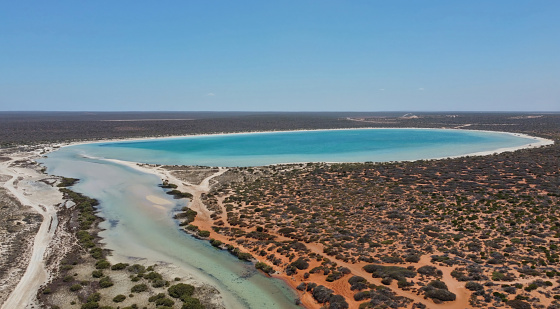 Drone photo of Little Lagoon near Denham in Western Australia, which is the westernmost publicly accessible town in Australia. It is located in the Shark Bay (Malgana: Gathaagudu) World Heritage Site in the Gascoyne region