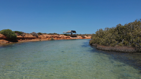 Drone photo of Little Lagoon near Denham in Western Australia, which is the westernmost publicly accessible town in Australia. It is located in the Shark Bay (Malgana: Gathaagudu) World Heritage Site in the Gascoyne region