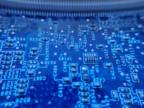 The macro photography of printed circuit board PCB. High technology theme wallpaper