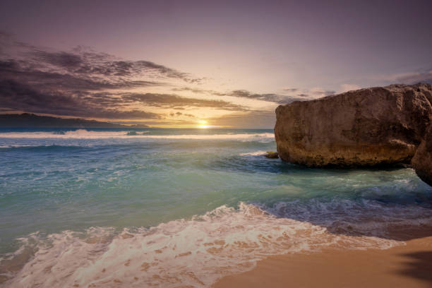 Sandy beach with the blue ocean and sunset scene background. Nature background