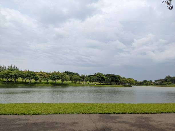 istock Landscape lake, track and wooden dock on BSB Semarang, Central Java. 2034802864