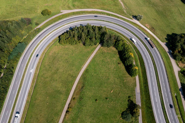 istock Rural highway bend, aerial view 2034828145