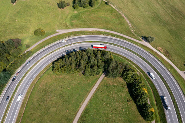 istock Rural highway bend, aerial view 2034831941