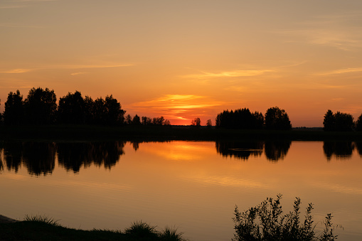 Scenery. Sunset on the lake