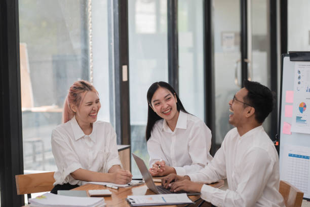 istock Businesspeople working together on new project in modern office. Teamwork concept. 2034845976