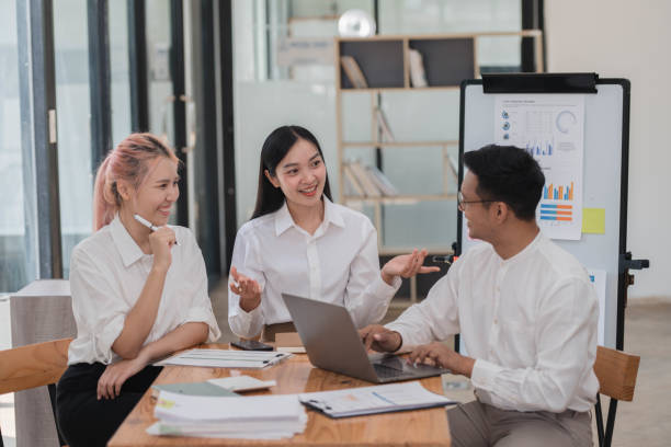 istock Businesspeople working together on new project in modern office. Teamwork concept. 2034848168