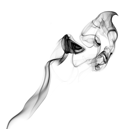 Black smoke on a white background with copy space.
