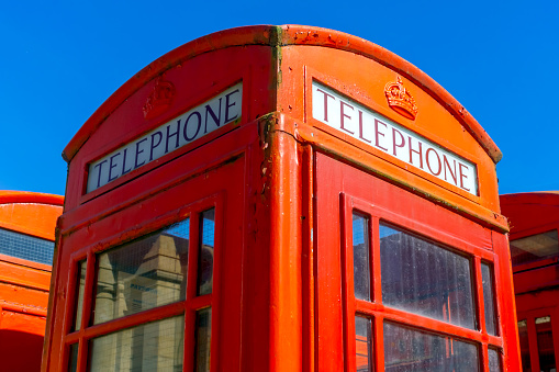 Stoer, Scotland September 14, 2022 : red phone box on main street in Stoer, Scotland