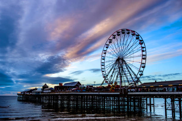 Sunset at central pier, Blackpool, North West England, UK a popular British seaside resort.