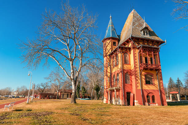 istock charming Owl Tower architecture along the Palic lake's embankment, creating a scenic backdrop for visitors to enjoy. 2034929658