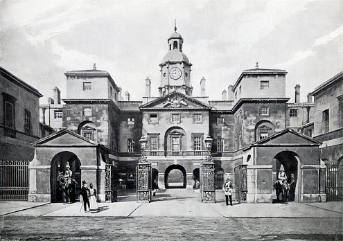 Horse Guards - a historic building in the City of Westminster, London, on Whitehall\n\nBuilt in the mid-18th century as a barracks for the Household Cavalry. \n\nHorse Guards was the entrance to the Palace of Whitehall and St James's Palace;  still ceremonially defended by the King's Life Guard.