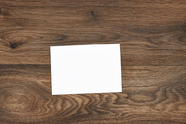 istock Wedding invitation card mockup  on wood table. Blank card mockup 2034961023