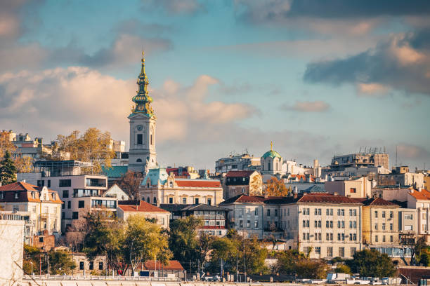 Iconic churches and urban architecture define Belgrade's skyline, creating a picturesque scene along the riverbanks.
