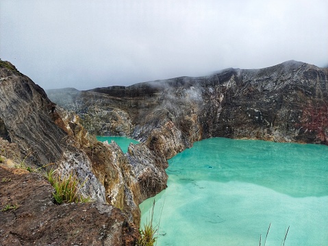 Natural scenery of Kelimutu Lake or what is known as the three-colored lake in Kelimutu National Park, Indonesia.