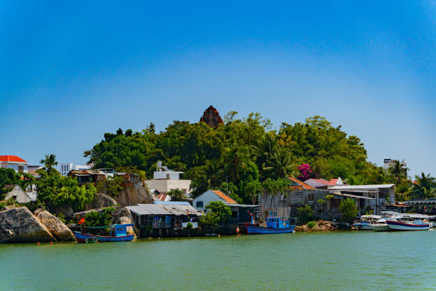 istock Houses on the river bank. 2034995916