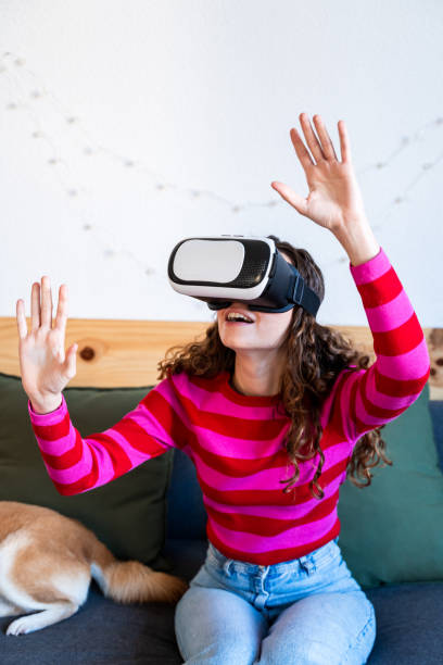 istock Woman with Dog Experiencing VR Technology 2035034547