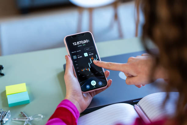 istock Analyzing Stock Market on Mobile 2035038746