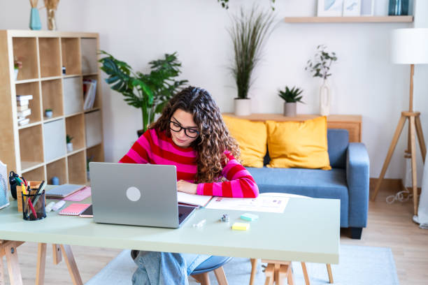 istock Concentrated on Laptop Work at Home 2035042508
