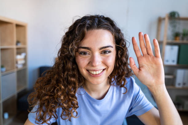 istock Cheerful Woman Greeting During Video Call 2035048800