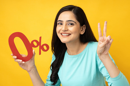 Photo of young girl wearing t-shirt isolated yellow background