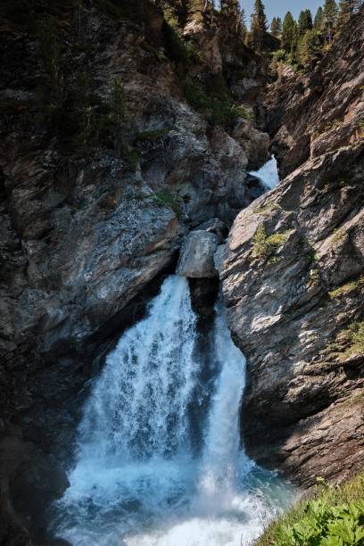 istock Waterfall in the Alps mountains, South Tyrol 2035057061