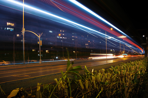 Time lapse photo of a colourful Dutch Motorway at night