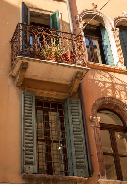 istock Decorative metalwork Balcony and Shuttered window 2035080699