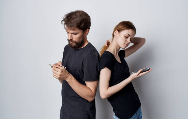 istock young couple in headphones technology music fun studio isolated background 2035133465