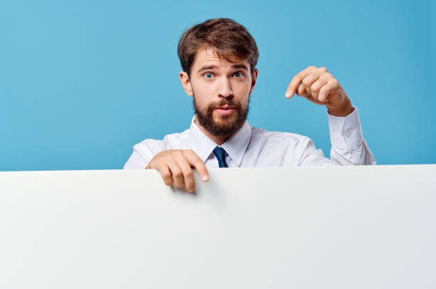 man in shirt with tie presentation advertisement official blue background. High quality photo
