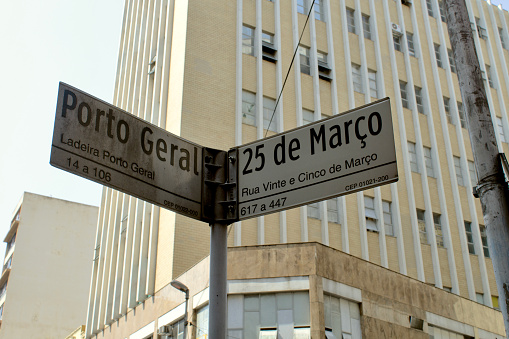 Sao Paulo, Brazil - September 14, 2019: Sign of Rua 25 de Março in São Paulo (25 de Março Street). A public road located in the central region of the state of São Paulo.