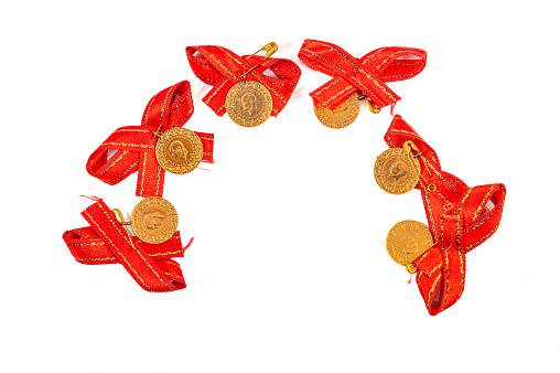 Quarter gold coins with ribbon