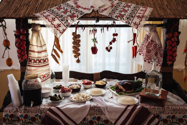 Cossack table in the best restaurants. Festive table at a wedding. Embroidered Ukrainian towel. Red and black color. Traditions. National Ukrainian cuisine. Fat, sausages, alcohol. Catering.