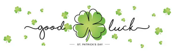 Vector illustration of Good Luck St Patricks Day handwritten typography lettering line design four leaf clover and many small clovers on isolated white background banner