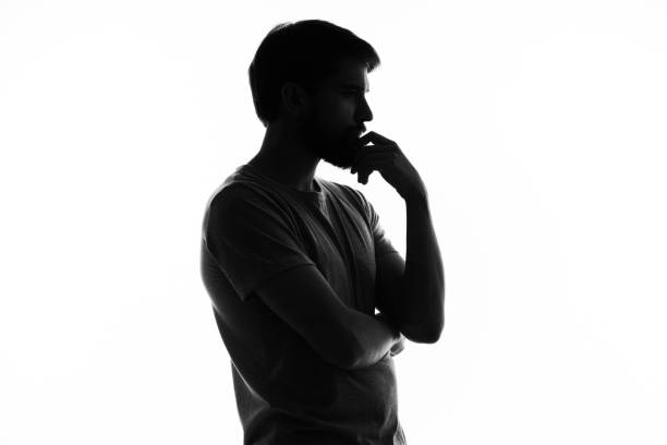 istock puzzled man gesturing with hands emotions silhouette white background 2035326917