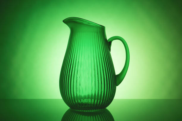 A stunning image of elegant glassware glowing in the soft backlight with a captivating helium filter effect, creating a mesmerizing and enchanting atmosphere.