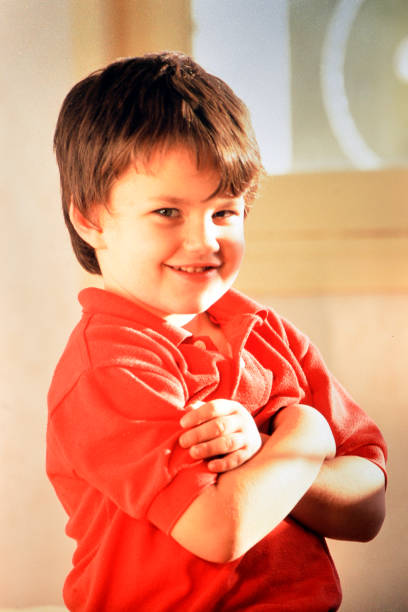 istock Young boy child crosses his arms on  july 20 2000 2035328483