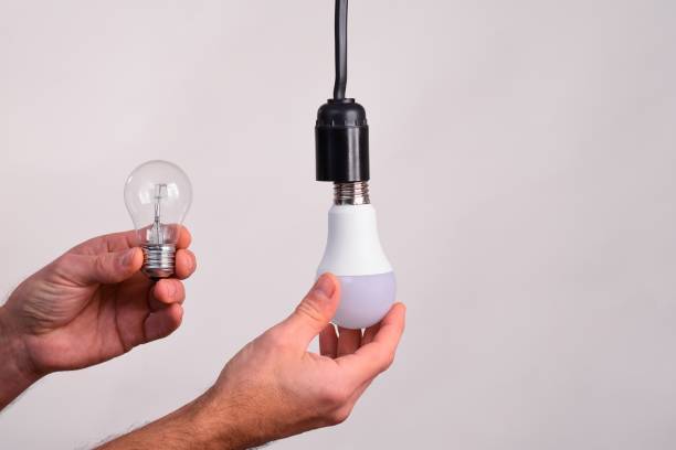 istock an incandescent light bulb and an LED lamp. 2035347298