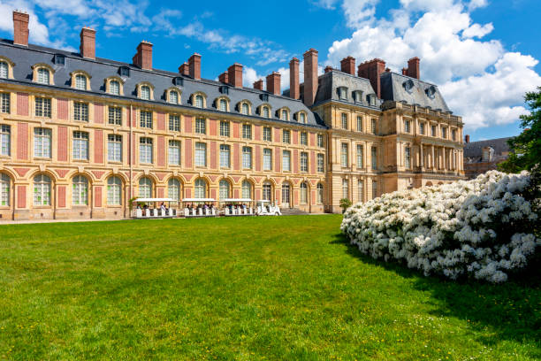 Fontainebleau palace and park in spring, France Fontainebleau, France - May 2019: Fontainebleau palace and park in spring chateau de fontainbleau stock pictures, royalty-free photos & images
