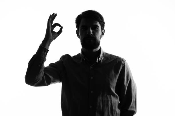 istock men gesture hands emotions cropped view light background incognito 2035350355