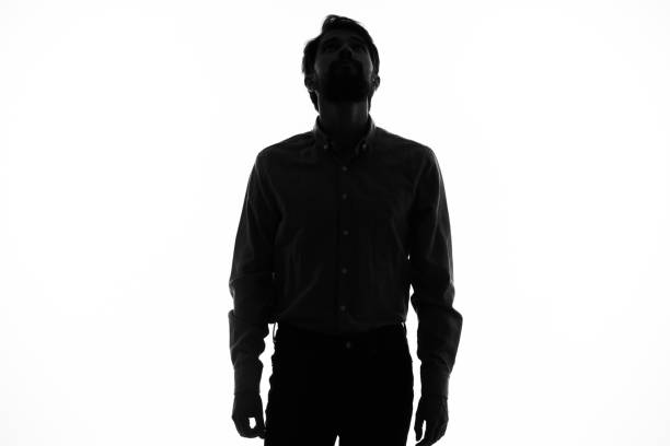 istock dark silhouette of a guy on a white background model cropped view close-up 2035350365