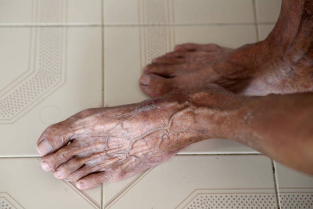 An Asian senior man's foot relaxing at home