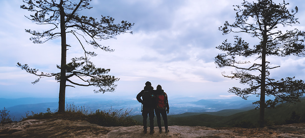 Photographer lover woman and man asians travel relax in the holiday. Photograph mountain landscapes atmosphere in the morning. In the winter. In Thailand