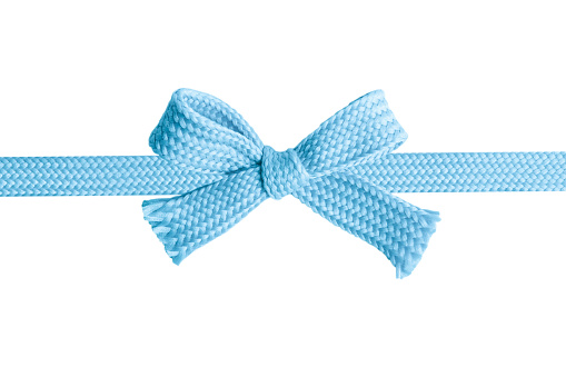 Blue bow made of thick knitted material on a blank background