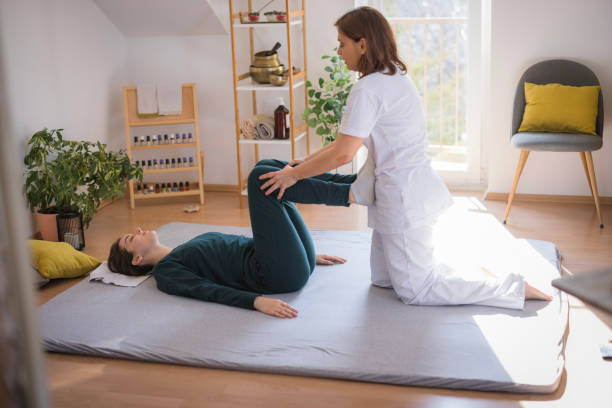 istock Woman undergoing shiatsu massage 2035372126