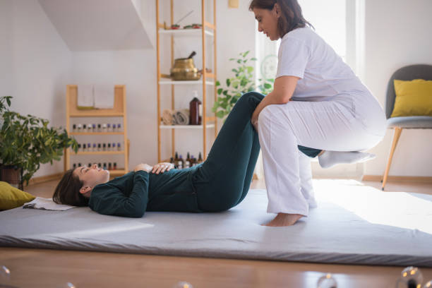 istock Woman undergoing shiatsu massage 2035372130