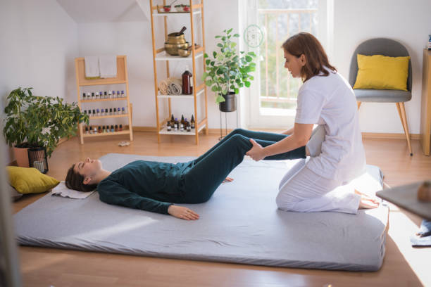 istock Woman undergoing shiatsu massage 2035372666