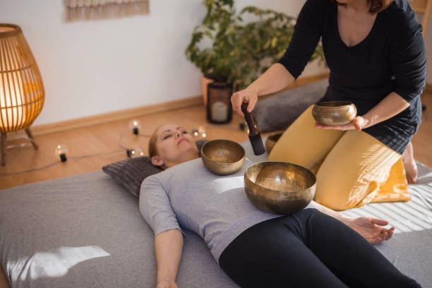 istock Therapist using Tibetan singing bowls in therapy 2035377622
