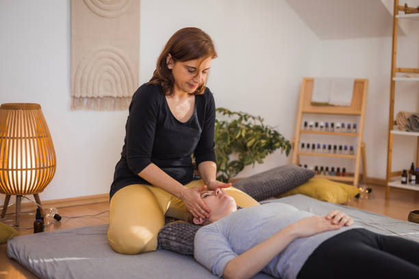 istock Woman having her forehead massaged 2035378148